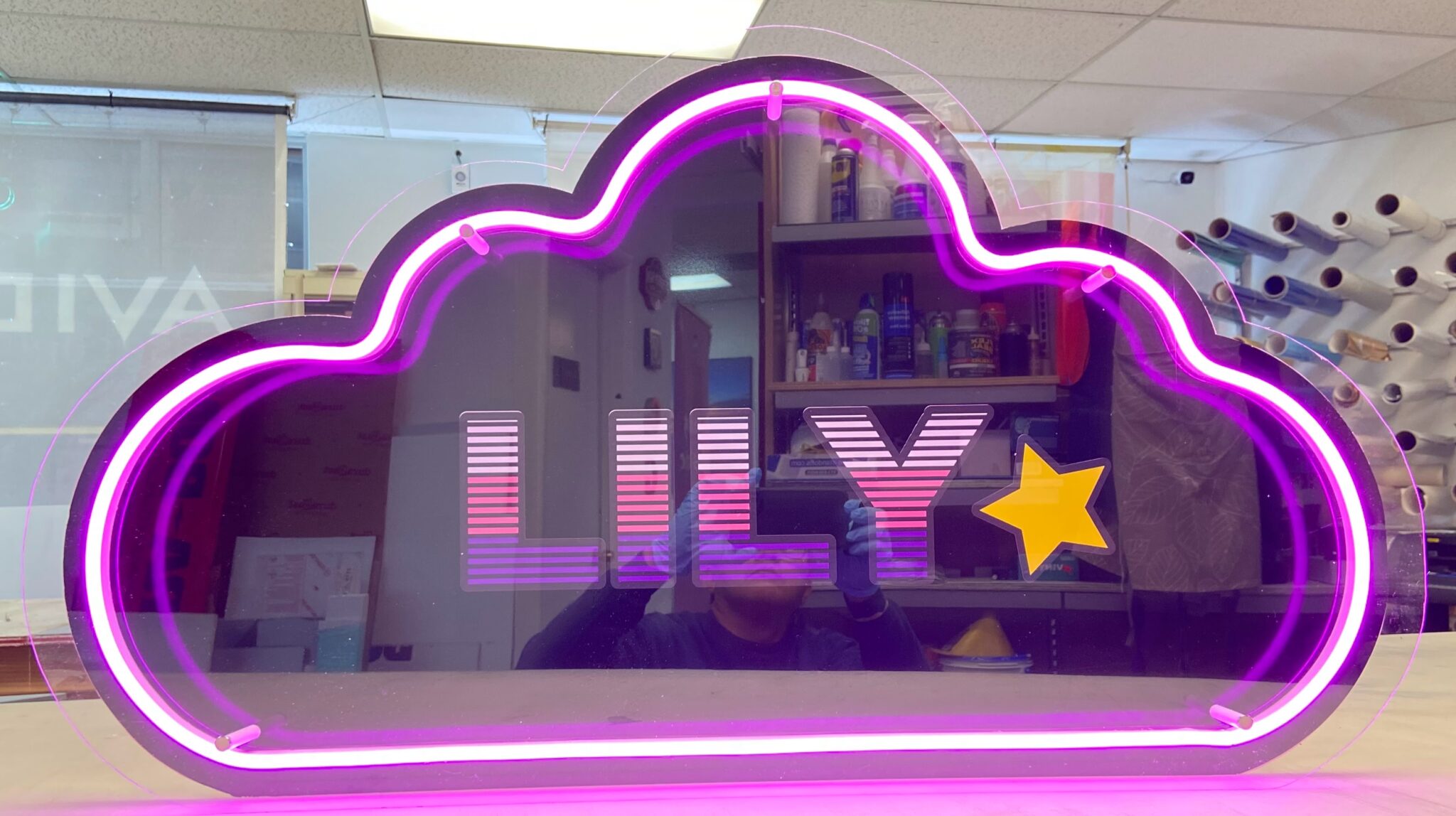 AVI Design technician performing LED sign maintenance and repair