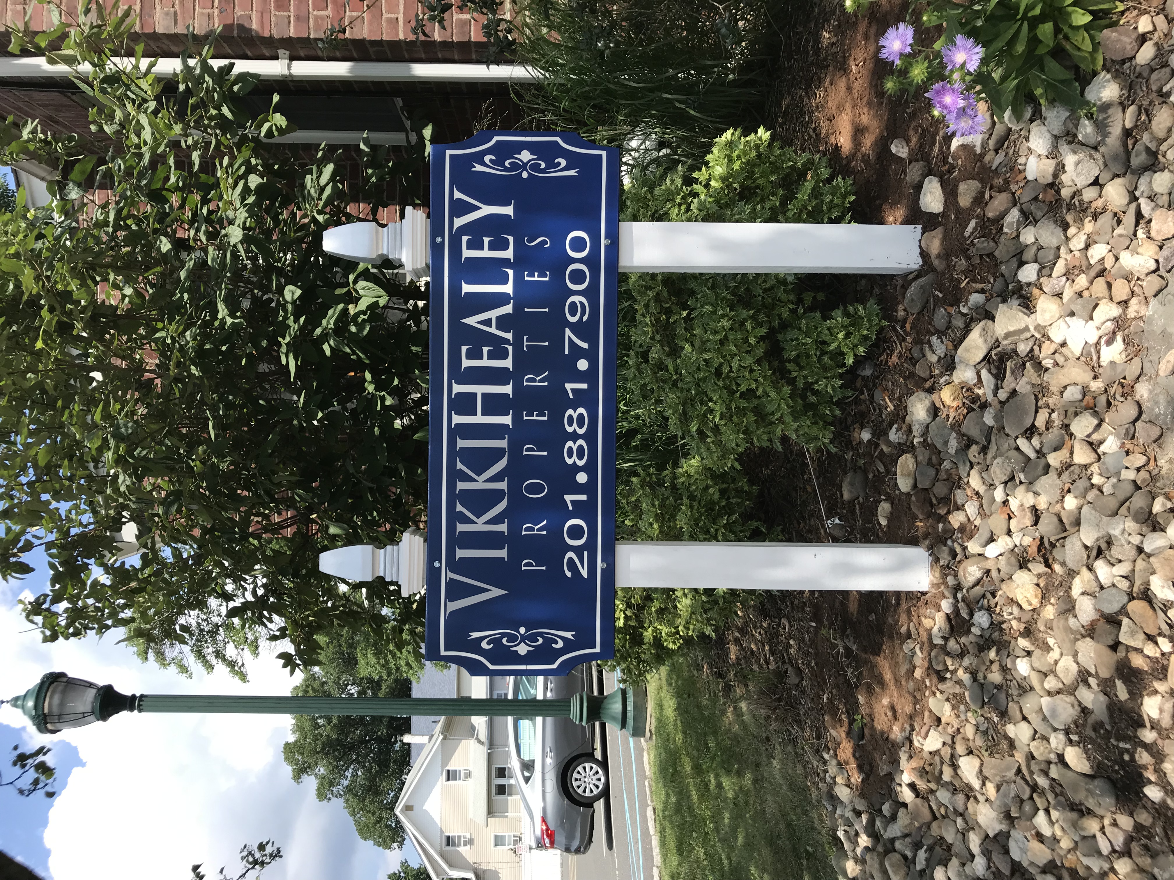 Modern medical office building with elegant halo-lit signage