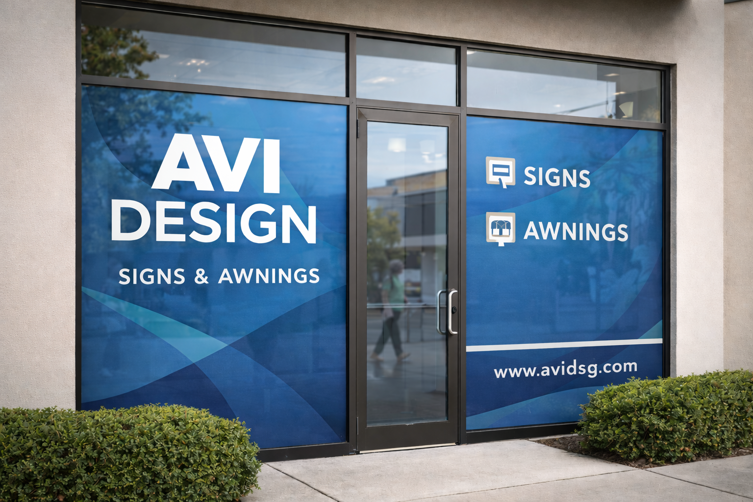 Custom vinyl lettering and logo on a storefront window